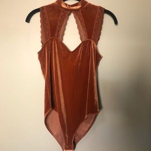 Rust/copper velvet bodysuit with keyhole opening